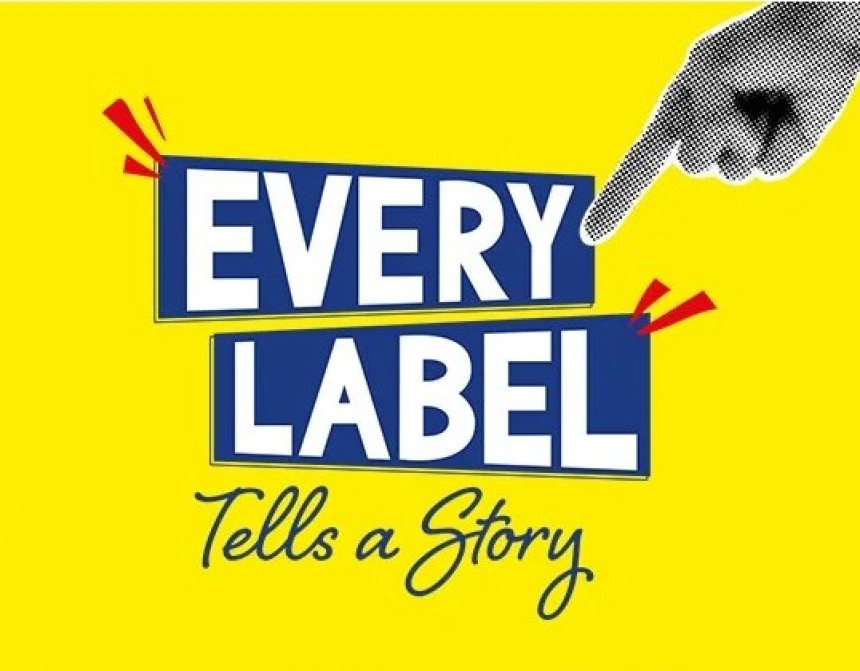 Napis: Every Label Tells a Story na rumenem ozadju
