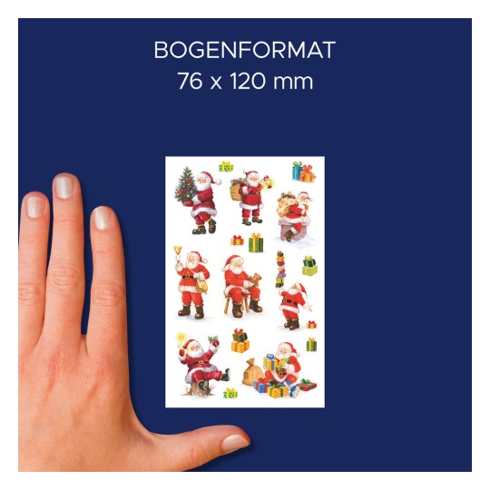 Slika prikazuje list nalepk z različnimi ilustracijami Božička, poleg pa je roka za referenco velikosti. Velikost lista je 76 x 120 mm.