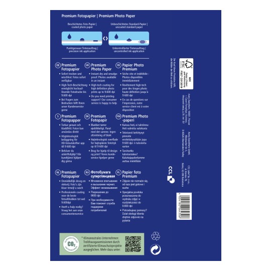 Slika prikazuje embalažo za vrhunski fotografski papir z več jeziki in informacijami o njegovi kakovosti, zaščiti pred madeži ter visokotehnološkem premazu za visokoločljive tiske do 9.600 dpi.