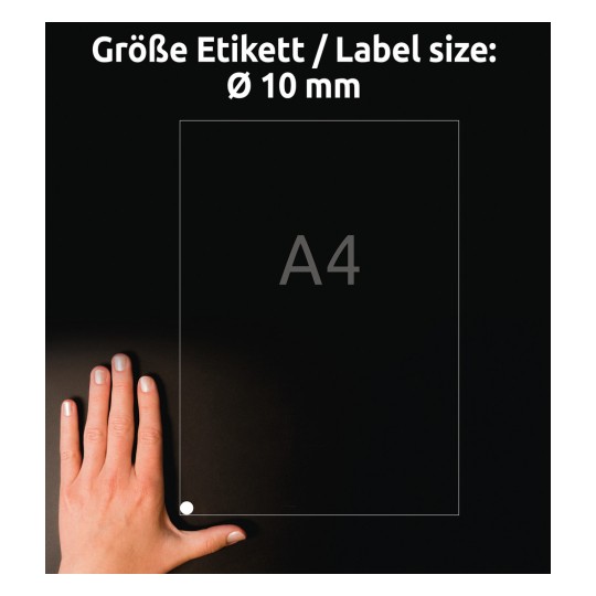 Slika prikazuje roko pod listom formata A4 z označeno velikostjo nalepke Ø 10 mm. Ozadje je temno, besedilo pa je v nemščini in navaja velikost nalepke.