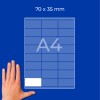 Mreža na listu A4 z nalepko velikosti 70 × 35 mm in roko v spodnjem levem kotu?
