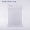 Slika prikazuje prozoren, plastičen pokrov z zaobljenim vrhom. Ima oznako, ki kaže nanj in na kateri piše 'TRANSPARENTNA PLASTIKA.'