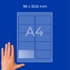 Diagram lista A4 s 96 × 50,8 mm pravokotnimi nalepkami v dveh stolpcih in roko v spodnjem levem kotu?